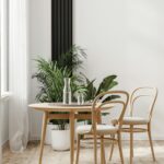 Dining table with wooden chairs near window, modern home interior, 3d rendering